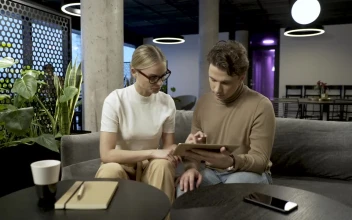 Stock Video Couple Brainstorming With A Tablet For PC