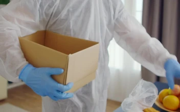 Stock Video Coronavirus Pandemic Volunteer Packing Food For PC