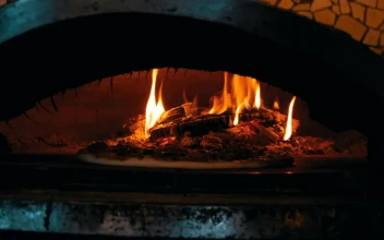 Stock Video Cooking Pizza In A Traditional Oven For PC