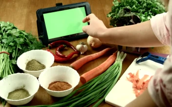 Stock Video Cooking And Using Tablet For PC