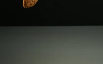 Stock Video Cookies Falling Into A Mirror Surface For PC