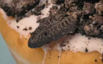 Stock Video Cookie Chunks Scattered On A Glazed Donut For PC