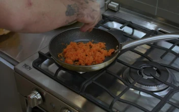 Stock Video Cook Preparing Something In A Pan For PC