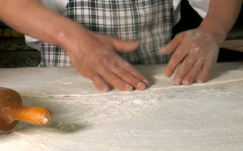 Stock Video Cook Preparing Dough For A Dish For PC