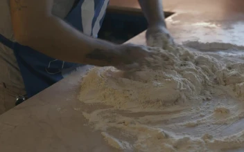 Stock Video Cook Mixing Flour For A Dough For PC