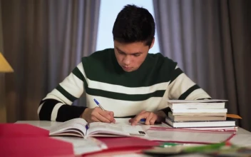 Stock Video Concentrated Boy Studying At Home For PC