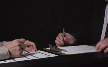 Stock Video Comparing Documents In An Interview For PC