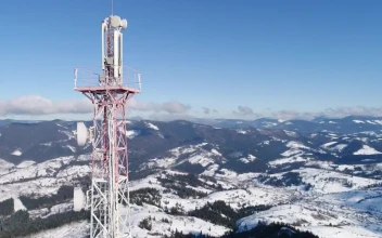 Stock Video Communications Tower In The Snowy Mountains Spinning Aerial Shot For PC