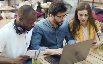 Stock Video College Students Working Together For PC