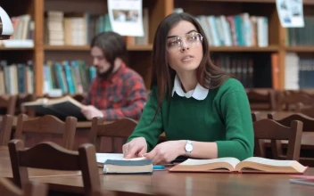 Stock Video College Student Thinking In Library For PC