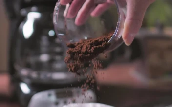 Stock Video Coffee Powder Being Poured On The Coffee Maker Filter For PC