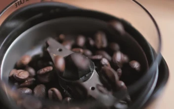 Stock Video Coffee Beans Falling Into A Coffee Pot For PC