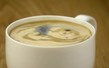 Stock Video Coffee Bean Falling Into A Cup Of Coffee For PC