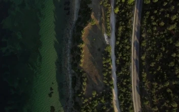 Stock Video Coastal Road Leading Towards A Village For PC