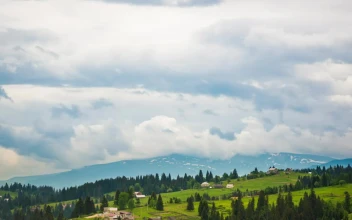 Stock Video Cloudy Sky Over A Countryside Town For PC
