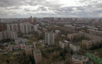 Stock Video Cloudy Skies Above Apartment Blocks For PC