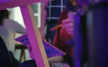 Stock Video Faces Of Two Women Making A Painting In A Workshop For PC