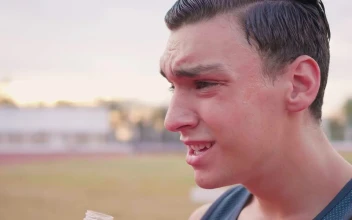 Stock Video Face Of An Exhausted Boy Drinking Water Outdoors For PC