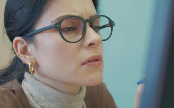 Stock Video Face Of A Woman Concentrating On Her Work For PC