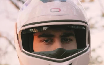Stock Video Face Of A Motorcycle Rider With A Helmet Putting On For PC
