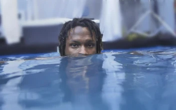 Stock Video Face Of A Man Leaning Out While He Floats On For PC