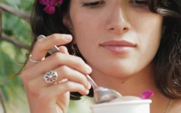 Stock Video Face Of A Girl Eating A Scoop Of Ice Cream For PC