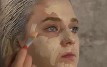 Stock Video Face Of A Girl Being Made Up For PC