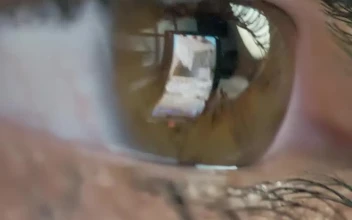 Stock Video Eye Looking At A Tablet For PC