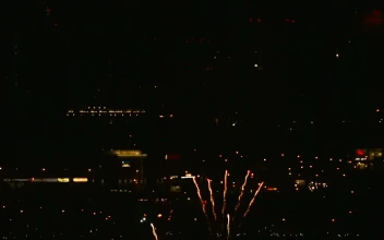 Stock Video Explosive Fireworks Flashing In The Evening For PC