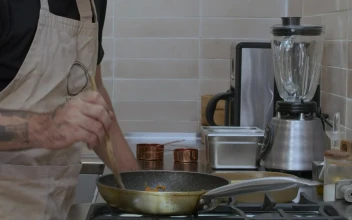 Stock Video Expert Cook Frying Something In A Pan For PC