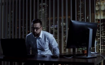 Stock Video Exhausted Worker Having A Break Late At Night For PC