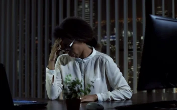 Stock Video Exhausted Woman Takes Off His Glasses For PC