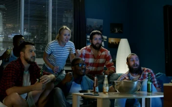 Stock Video Exciting Fans Cheering For Sports On The Tv For PC