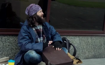 Stock Video Excited Happy Homeless Is Drumming On A Briefcase For PC