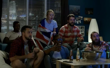Stock Video Excited Friends Watching Sports On Tv For PC