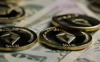 Stock Video Ethereum Golden Coins Over Dollar Bills For PC