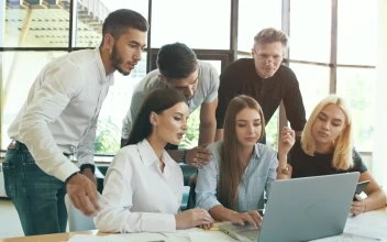 Stock Video Entrepreneurs Working Group Discussing A Project For PC