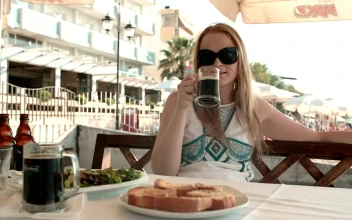 Stock Video Enjoying Lunch At A Seaside Cafe For PC