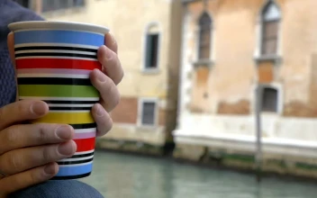 Stock Video Enjoying A Mug Of Tea By The River In Venice For PC