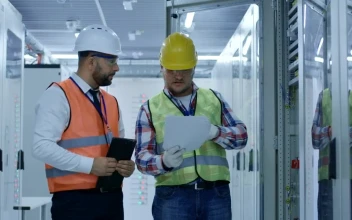 Stock Video Engineers Working With Electrical Equipment For PC