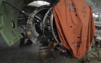 Stock Video Engineers Working On A Jet Engine For PC