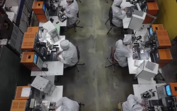 Stock Video Engineering Staff Working In A Factory For PC