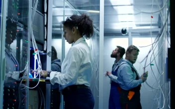 Stock Video Engineer Team Working In A Server Room For PC