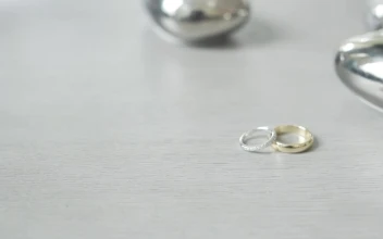 Stock Video Engagement Rings On A Wedding Table For PC