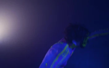 Stock Video Energetic Dance Of A Boy With A Neon Mask For PC