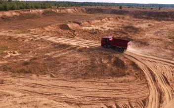 Stock Video Empty Truck Heading Down A Dusty Road For PC