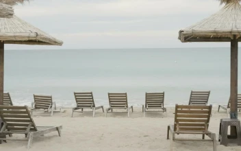 Stock Video Empty Tourist Beach On An Overcast Day For PC