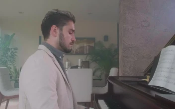 Stock Video Elegant Man Playing The Piano In A Luxurious Home For PC