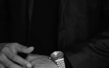 Stock Video Elegant Man In Suit Checks The Time On His Luxurious For PC
