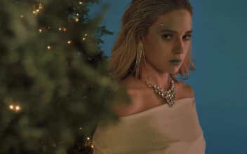 Stock Video Elegant And Captivating Girl Among Christmas Trees For PC